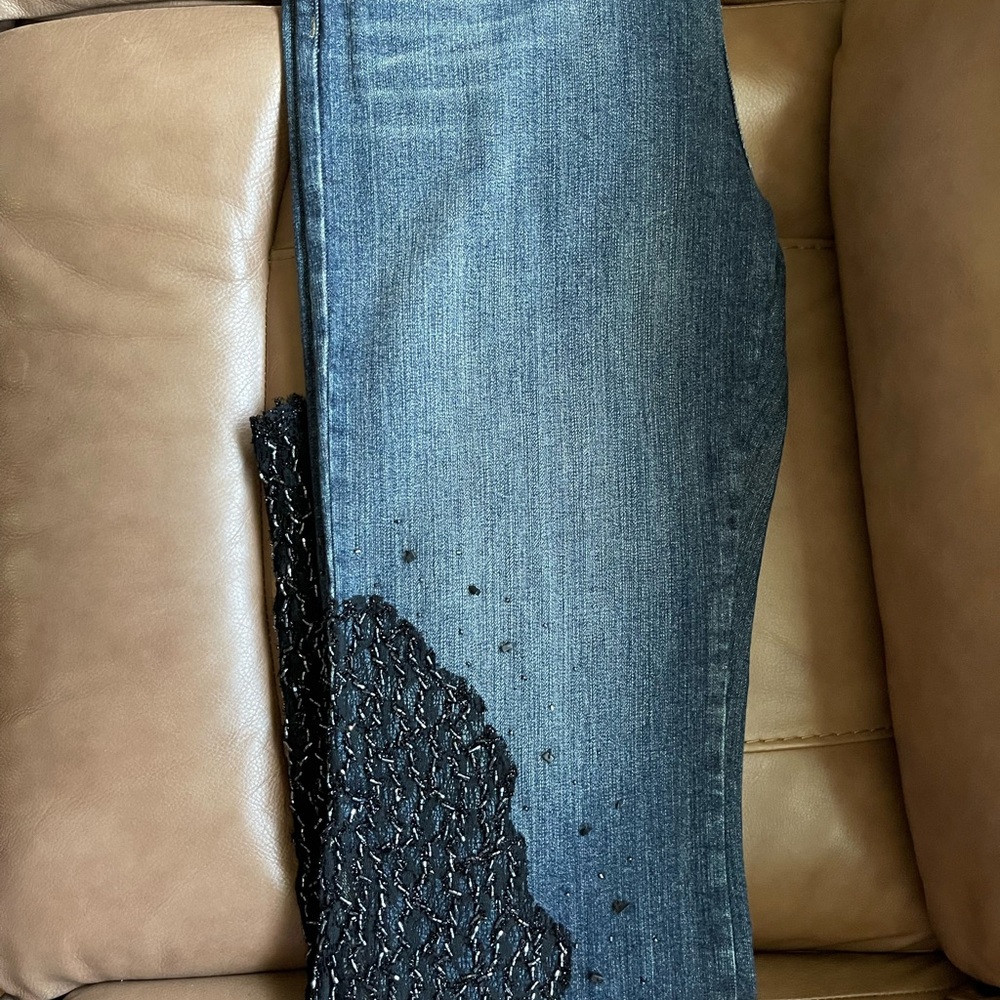 Women’s trendy beaded jeans.
